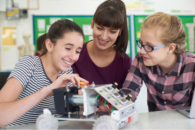 Public charter school teacher takes a hands-on approach to teaching a science project.